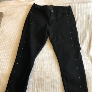 Women’s black studded jeans